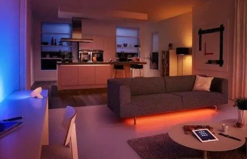 Smart lighting installation Lawrence KS - automated switches and color-changing bulbs